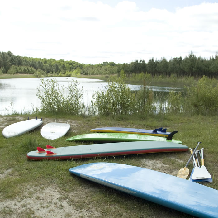 stand up paddleboard school in the forest